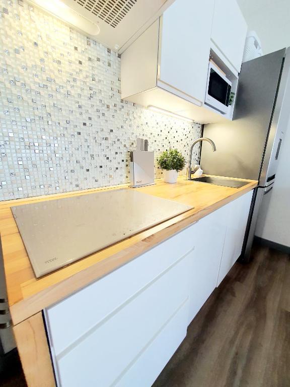 Kuchyňa alebo kuchynka v ubytovaní Apartament & Spa 5 Mórz