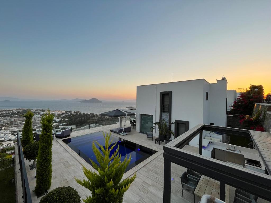 a villa with a view of the ocean at Villa Aylinda with private heated Pool in Bodrum City