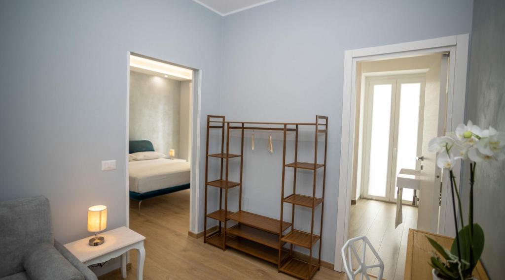 Postel nebo postele na pokoji v ubytování Palazzo Brienza