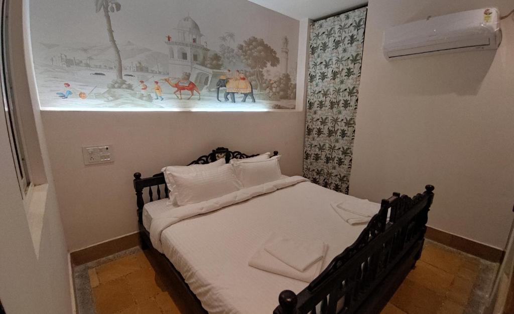 Postel nebo postele na pokoji v ubytování Kiran Apartment