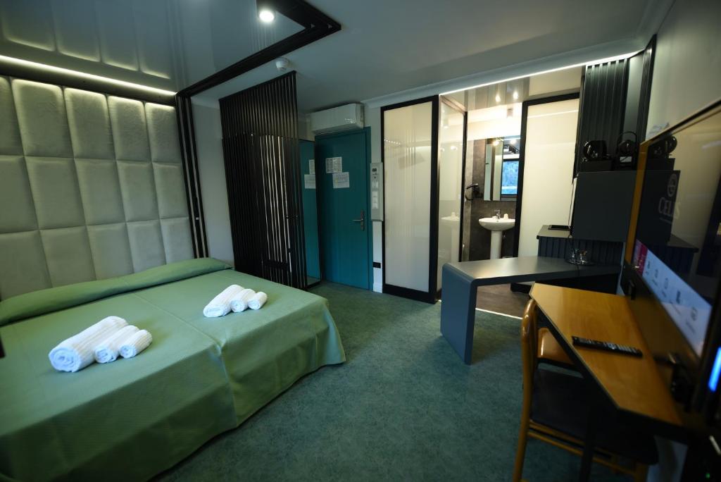 TV a/nebo společenská místnost v ubytování Hotel Celis