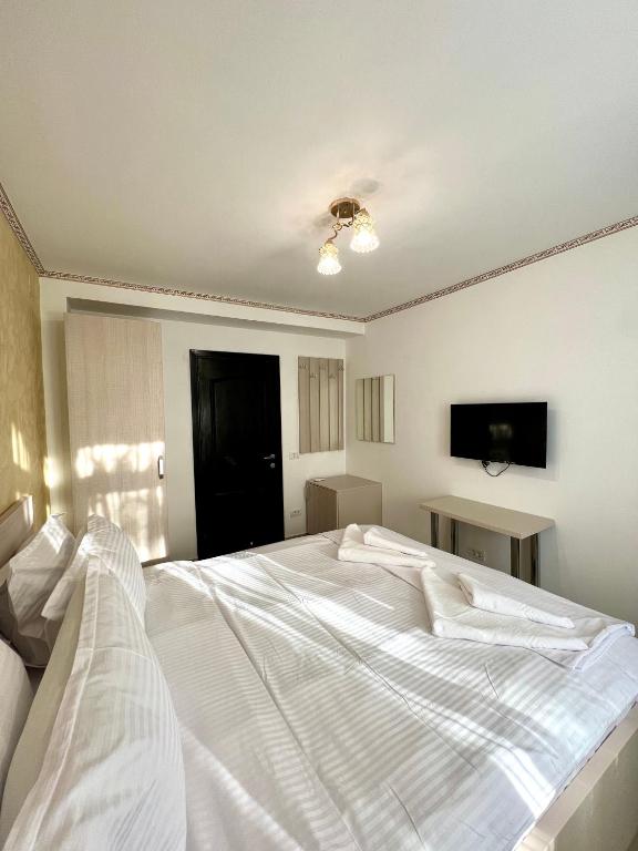 Postel nebo postele na pokoji v ubytování Hotel Marina 2