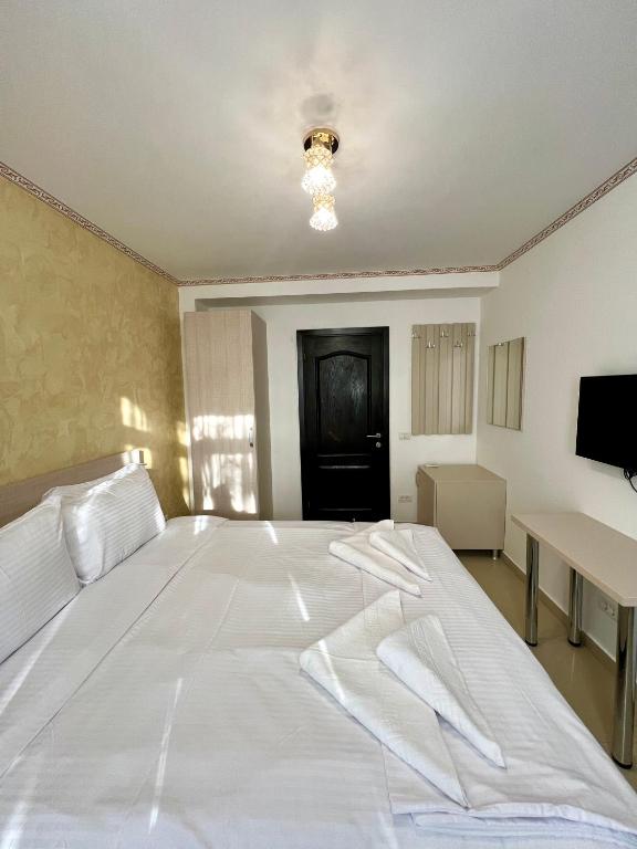 Postel nebo postele na pokoji v ubytování Hotel Marina 2