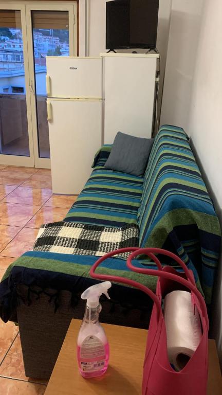 Łóżko lub łóżka w pokoju w obiekcie casa al mare a Scalea