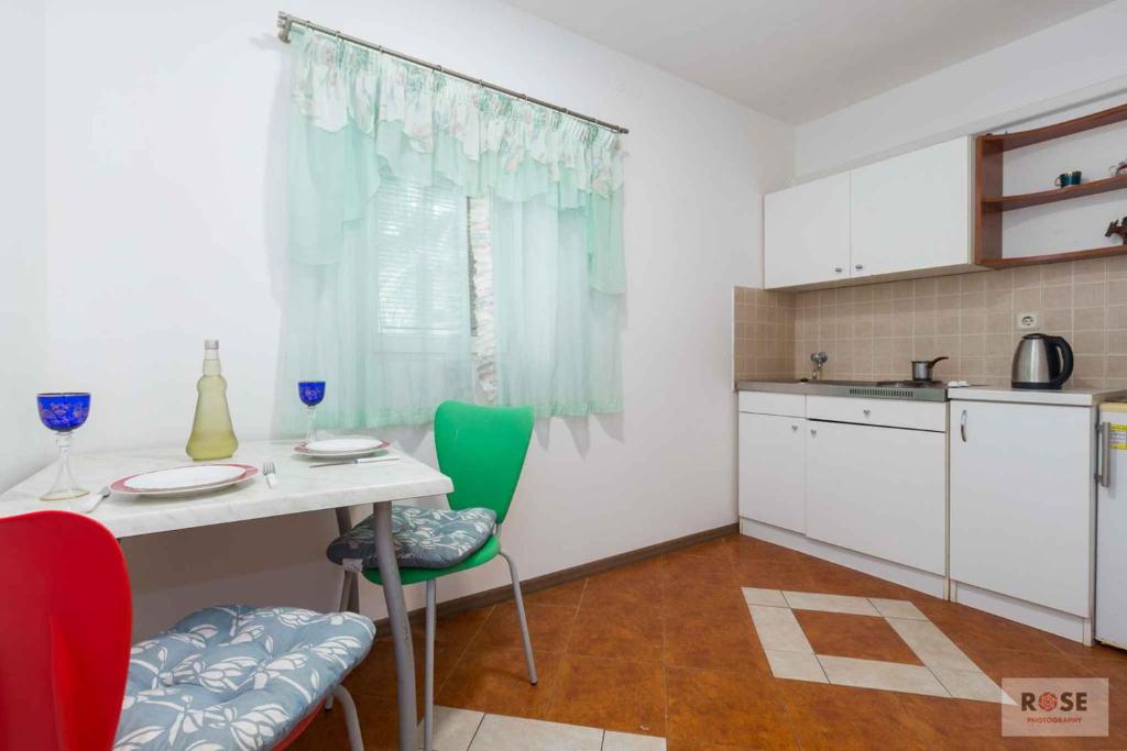Kuchyň nebo kuchyňský kout v ubytování Apartments in Porec/Istrien 37747