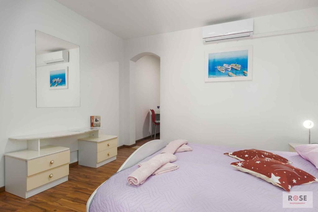 Postel nebo postele na pokoji v ubytování Apartments in Porec/Istrien 37747