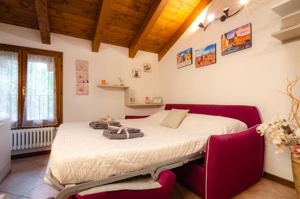 Łóżko lub łóżka w pokoju w obiekcie Casa Quarto di Luna