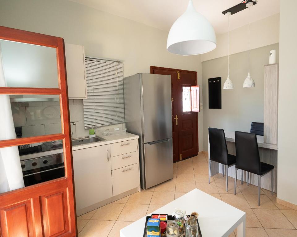 Kuchyň nebo kuchyňský kout v ubytování Happinest Private Apartment