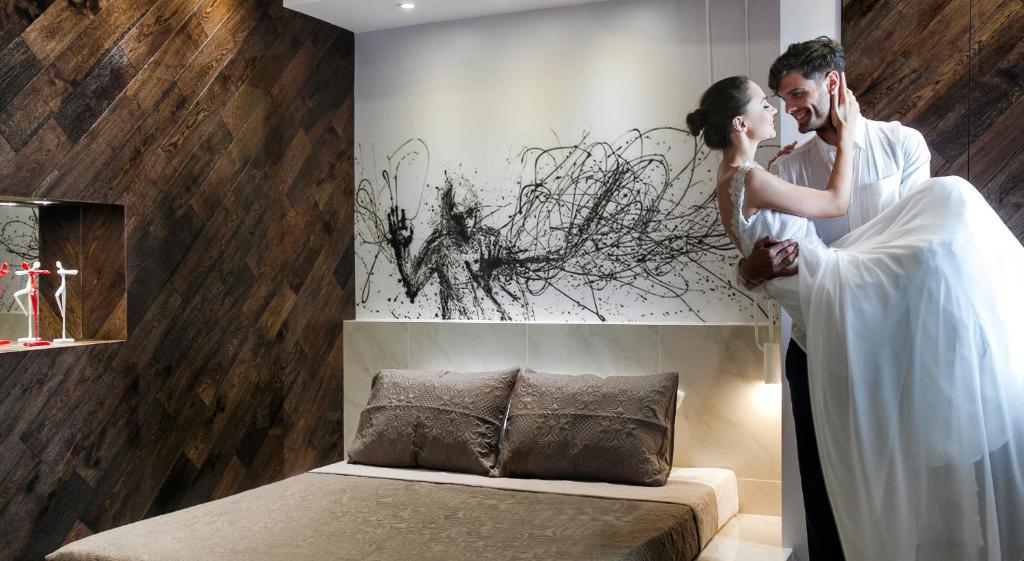 Postel nebo postele na pokoji v ubytování Privée Santorini