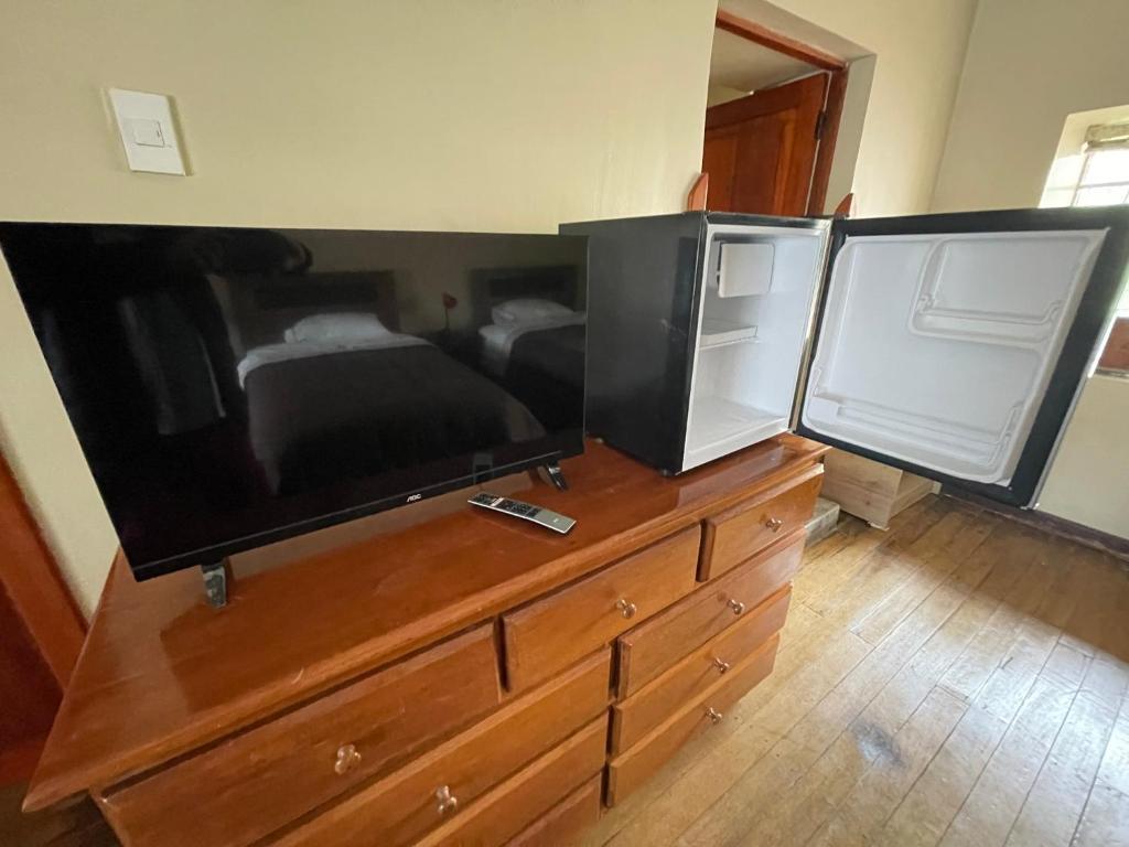 TV a/nebo společenská místnost v ubytování Anka Wasi Lodging