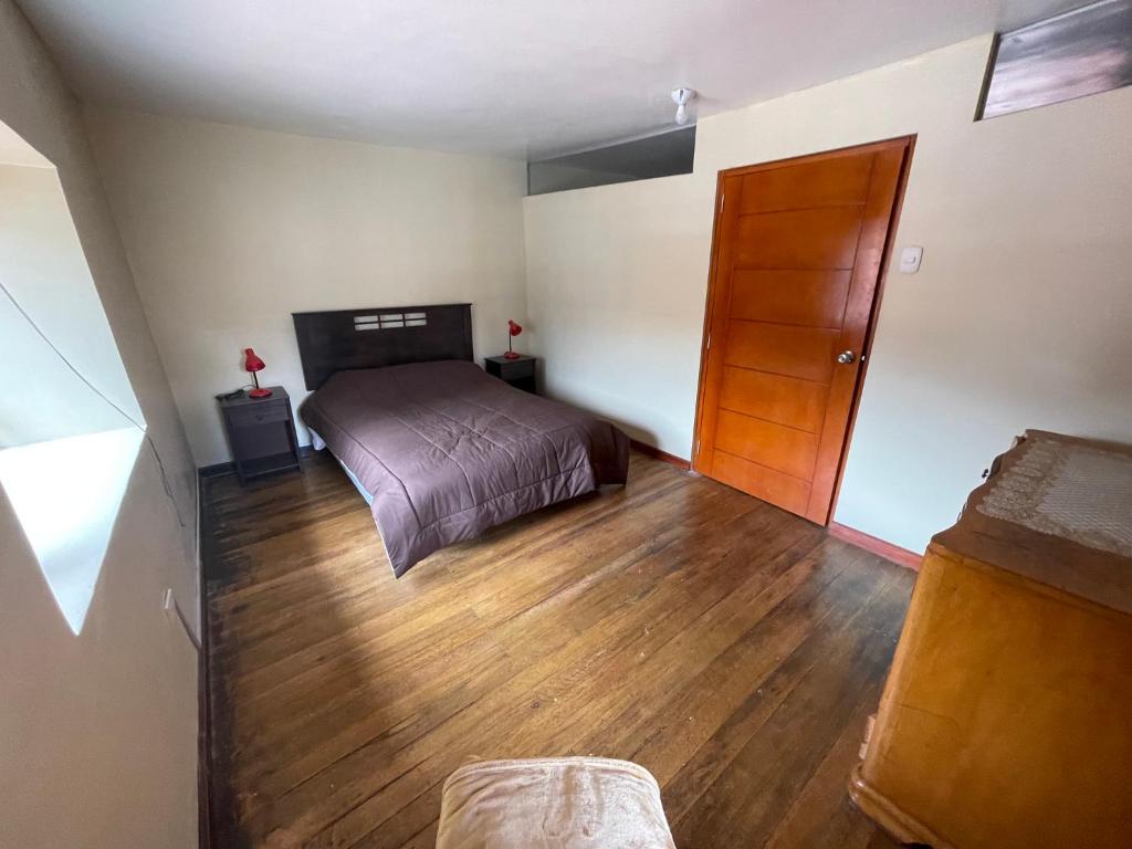 Postel nebo postele na pokoji v ubytování Anka Wasi Lodging