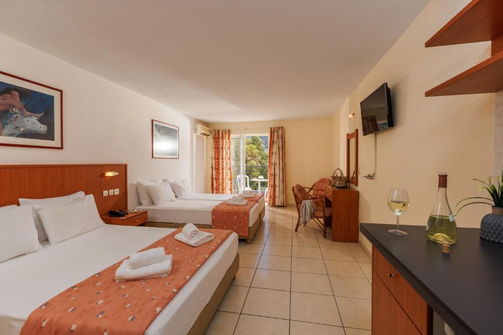 Postel nebo postele na pokoji v ubytování Agrabella Hotel