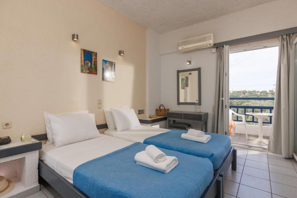 Postel nebo postele na pokoji v ubytování Agrabella Hotel