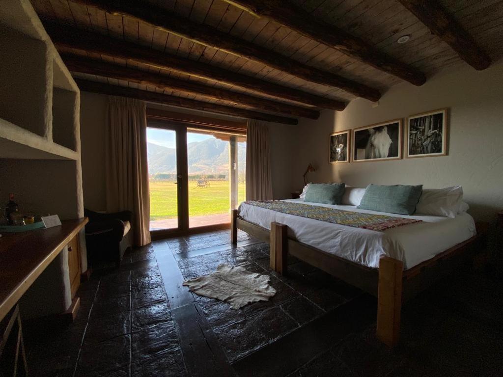 Postel nebo postele na pokoji v ubytování Hotel Casa De Campo