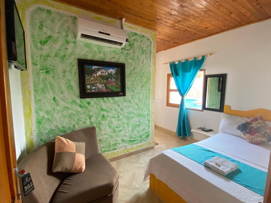 Postel nebo postele na pokoji v ubytování Hotel imperial