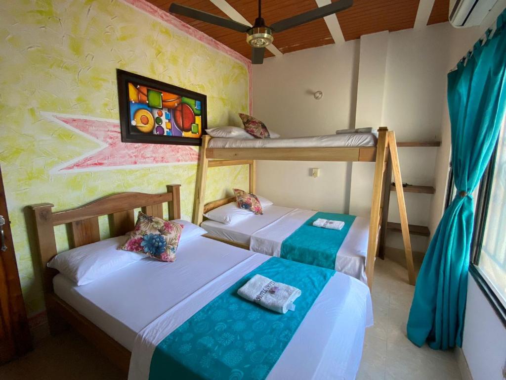 Postel nebo postele na pokoji v ubytování Hotel imperial