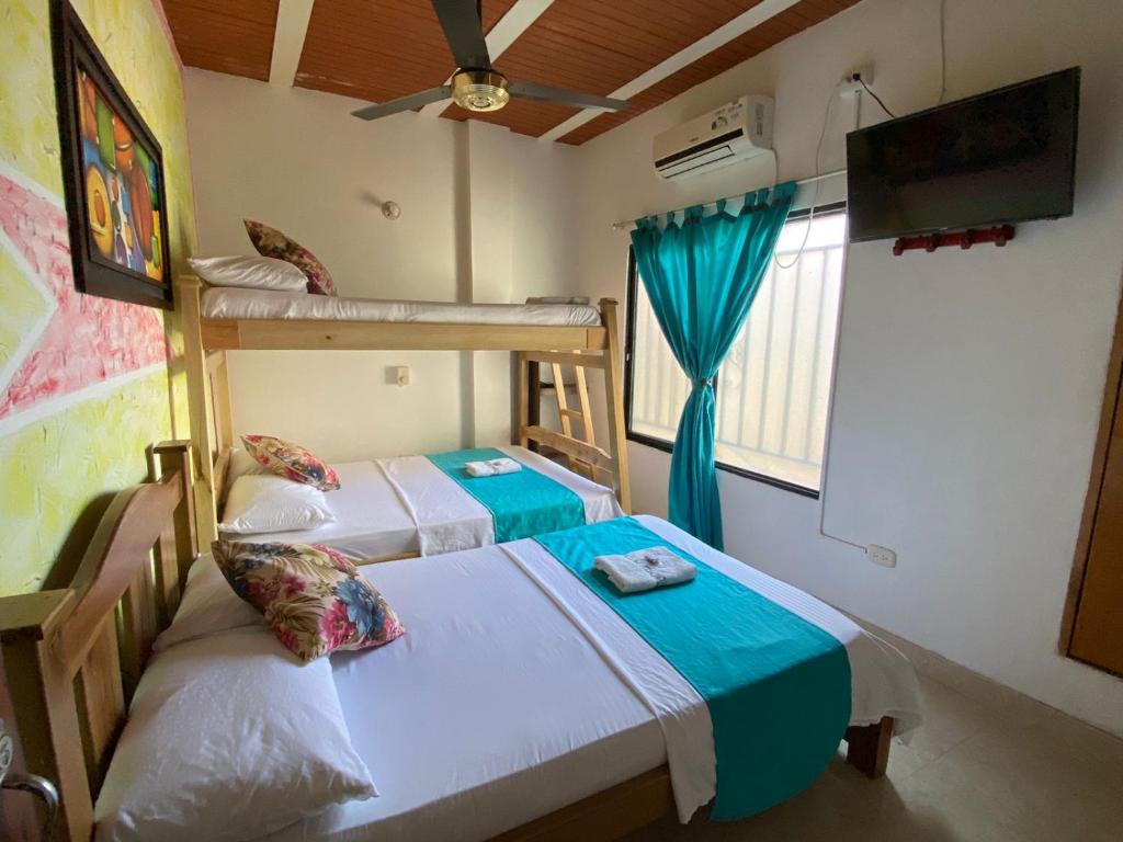 Postel nebo postele na pokoji v ubytování Hotel imperial
