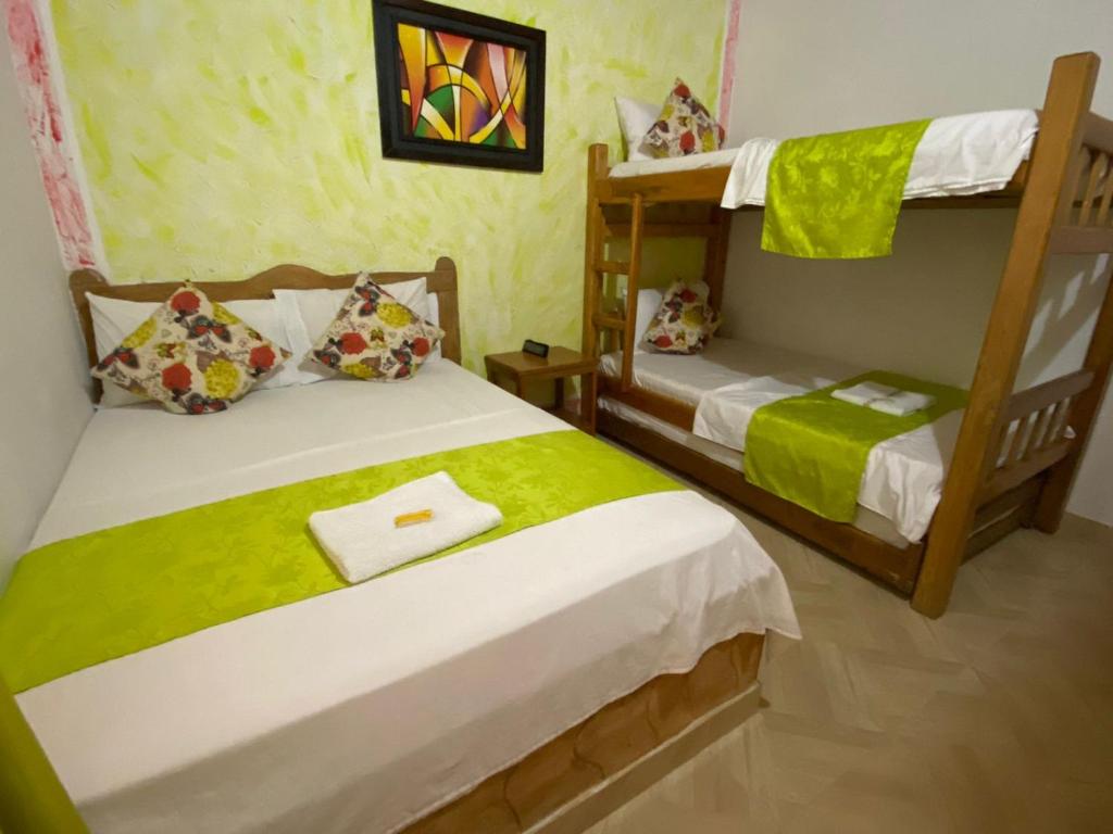 Postel nebo postele na pokoji v ubytování Hotel imperial