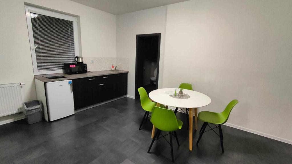 Kuchyň nebo kuchyňský kout v ubytování Apartmány u golfu