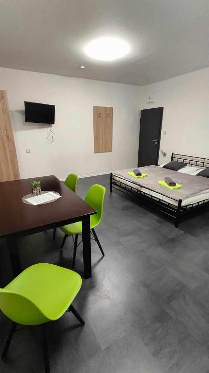 Postel nebo postele na pokoji v ubytování Apartmány u golfu