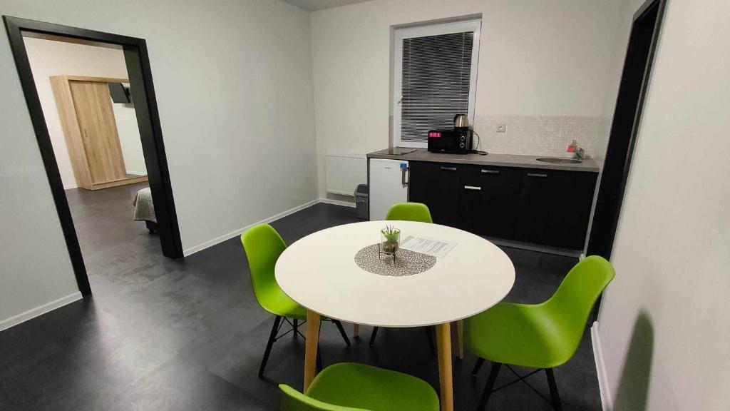 Kuchyň nebo kuchyňský kout v ubytování Apartmány u golfu