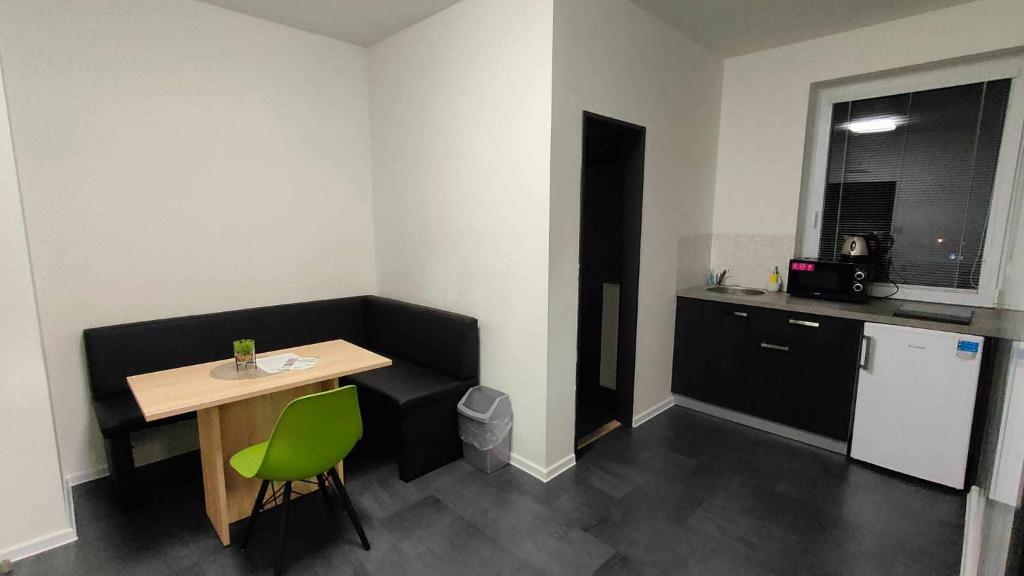 Kuchyň nebo kuchyňský kout v ubytování Apartmány u golfu