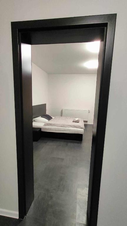 Postel nebo postele na pokoji v ubytování Apartmány u golfu