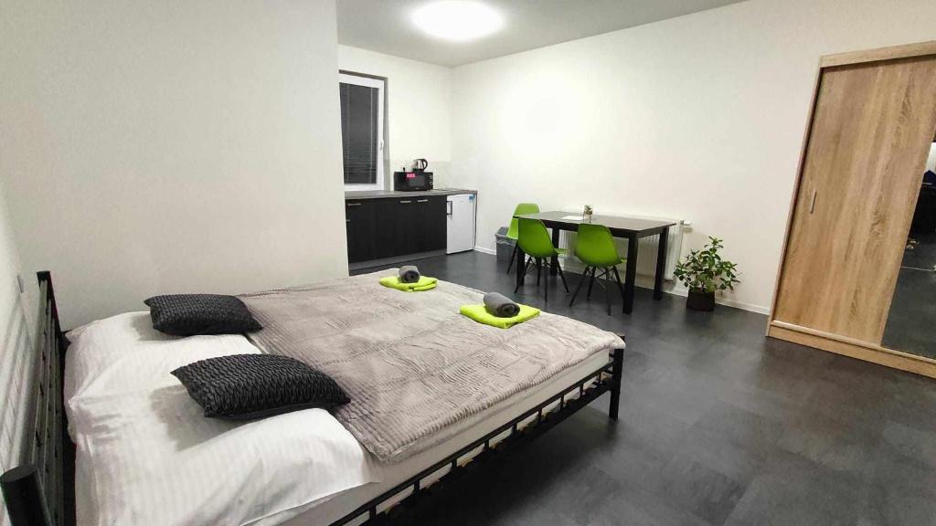 Postel nebo postele na pokoji v ubytování Apartmány u golfu