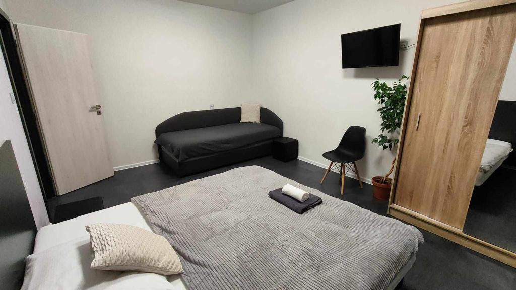 Postel nebo postele na pokoji v ubytování Apartmány u golfu