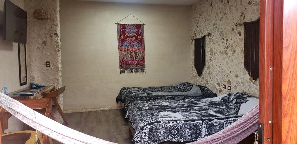 Postel nebo postele na pokoji v ubytování Casa los Jarochos