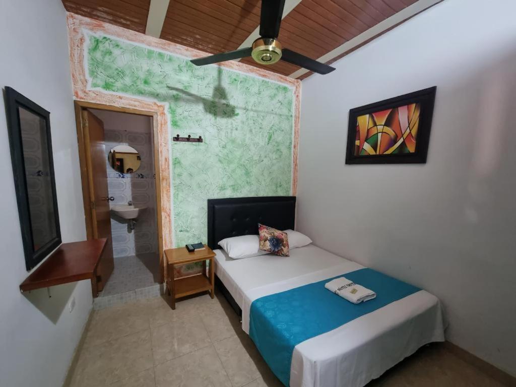 Postel nebo postele na pokoji v ubytování Hotel imperial
