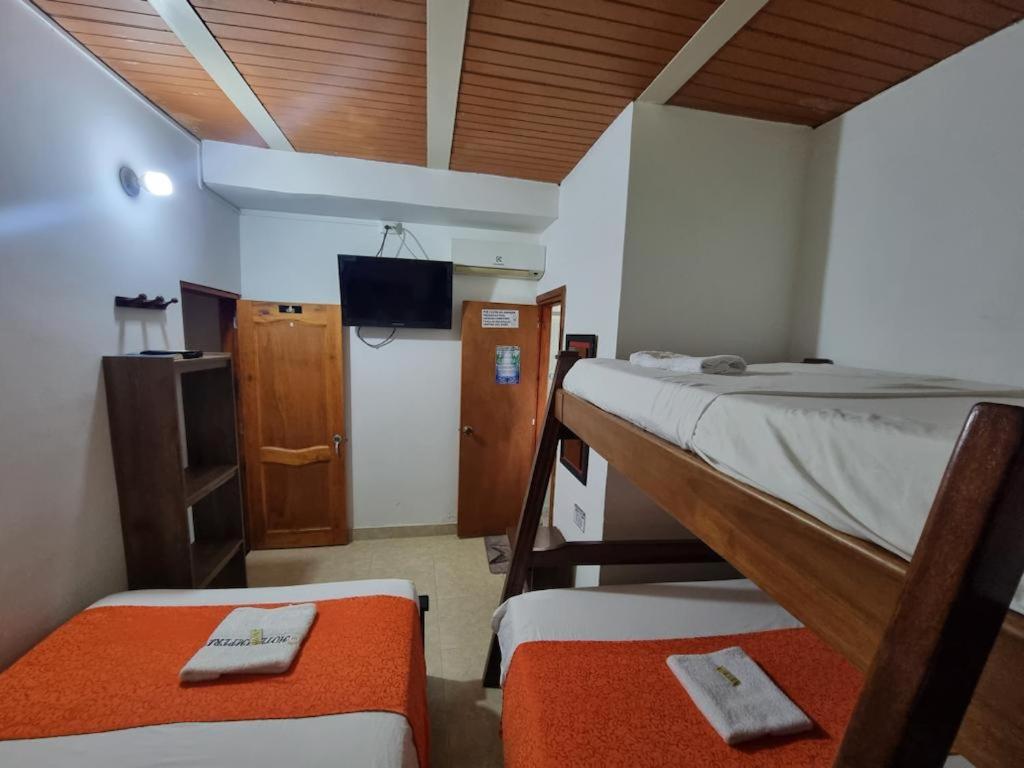 Postel nebo postele na pokoji v ubytování Hotel imperial