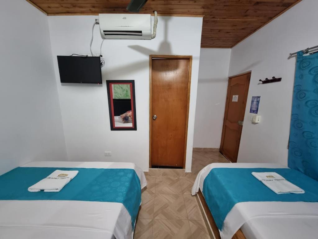 Postel nebo postele na pokoji v ubytování Hotel imperial