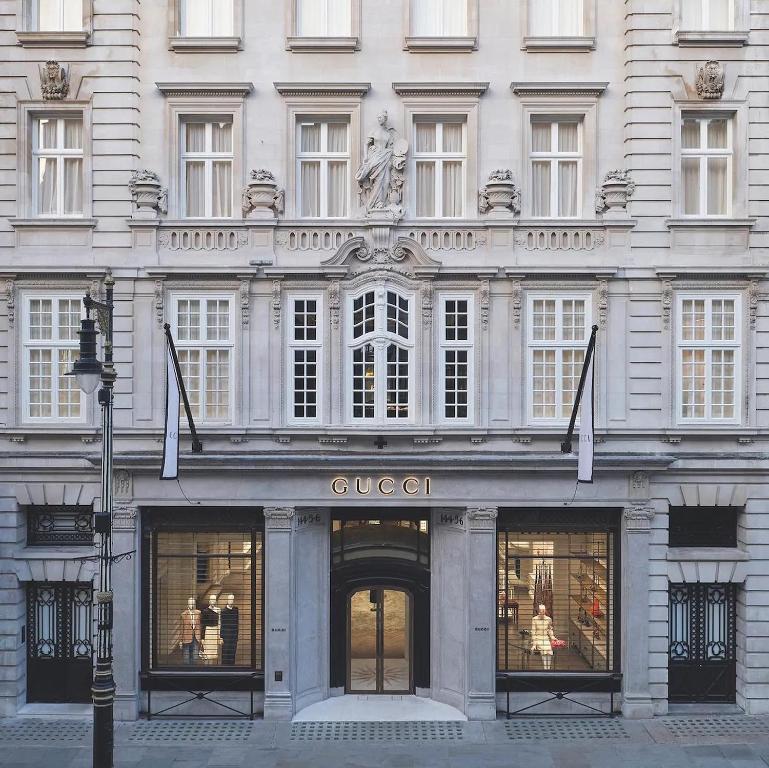 a quest store in front of a building at Bond Street Mayfair Penthouse in London