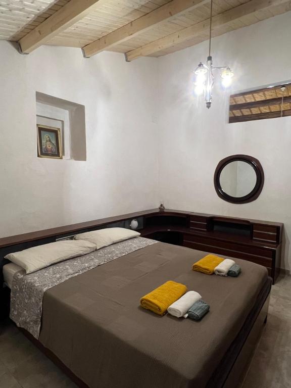 Postel nebo postele na pokoji v ubytování Casa di Mirto