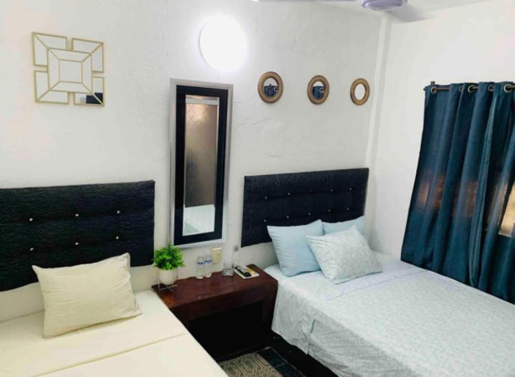 Postel nebo postele na pokoji v ubytování 08 Habitación Independiente en Zona Romántica a solo 3 cuadras de la playa