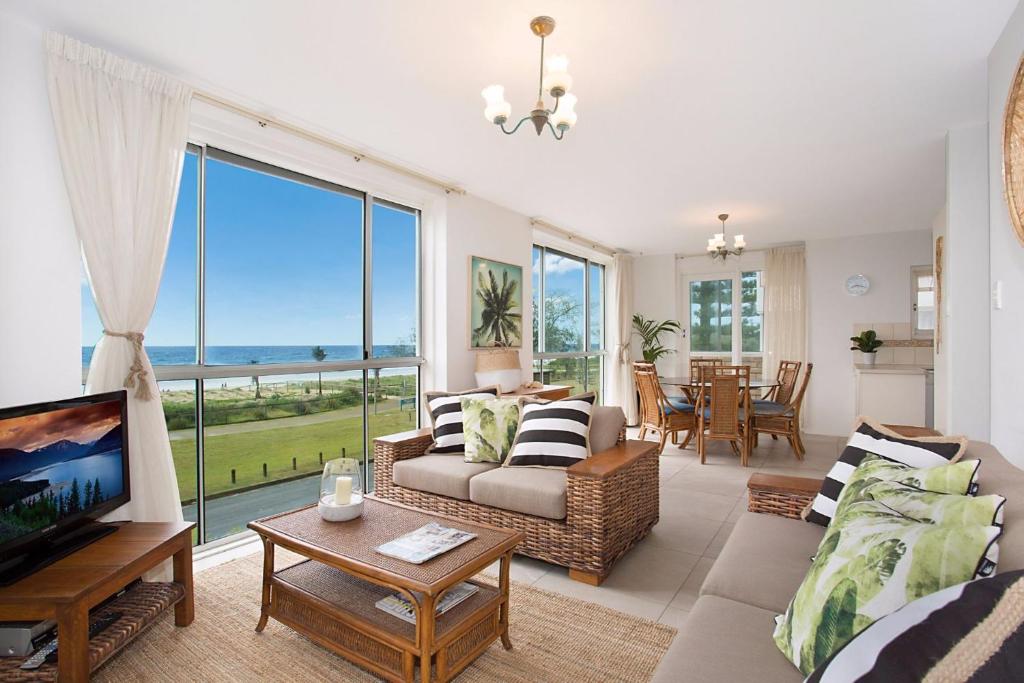 a living room with a view of the ocean at A Perfect Stay - King Tide in Gold Coast