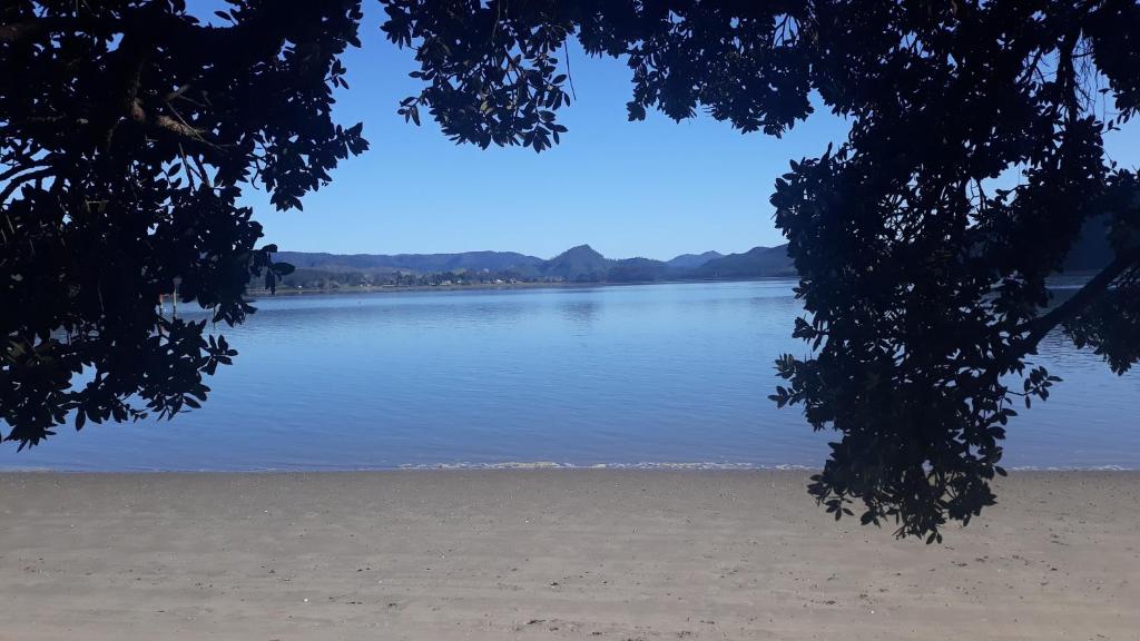 a view of a body of water at Anchor watch in Whangamata