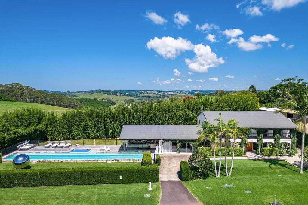 an aerial view of a house with a swimming pool at A Perfect Stay - Villa St Helena in Byron Bay