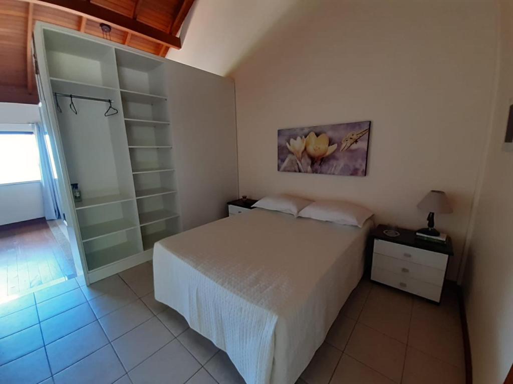 Postel nebo postele na pokoji v ubytování Ap Praia das Cordas