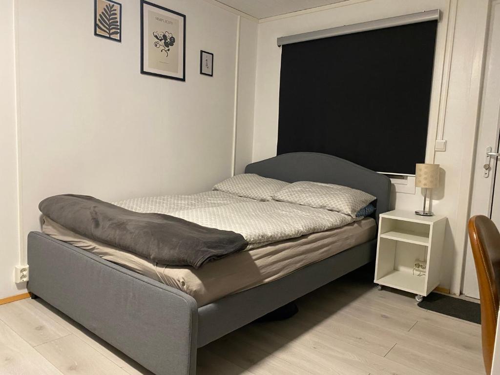 Postel nebo postele na pokoji v ubytování K&F Apartment