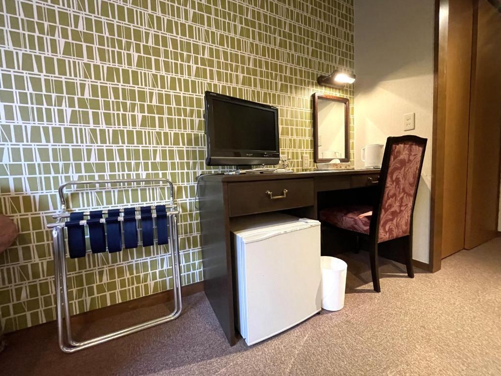 TV a/nebo společenská místnost v ubytování Heidihof Hotel