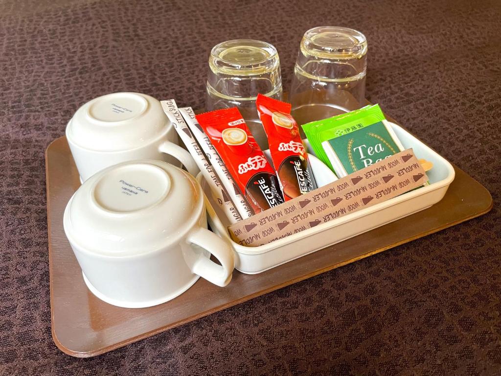 Příslušenství pro přípravu čaje a kávy v ubytování Heidihof Hotel