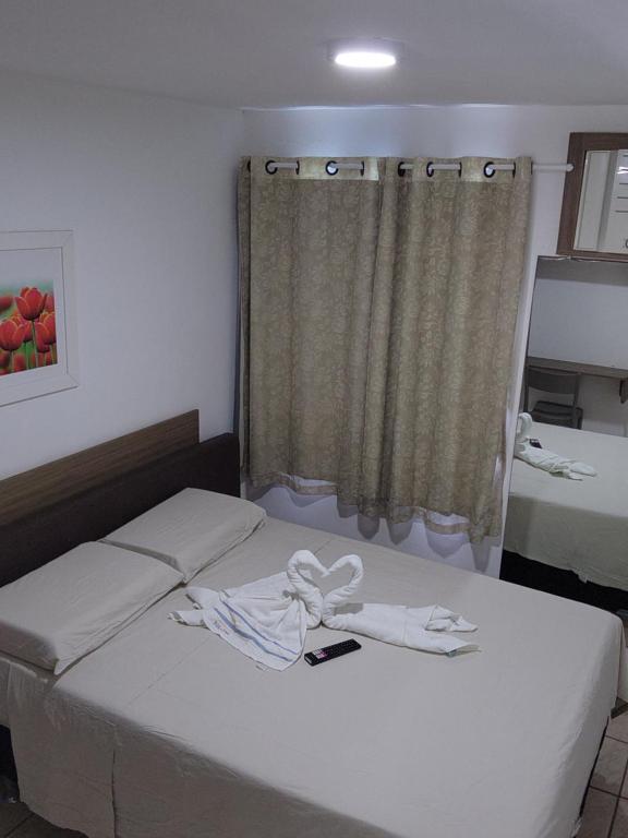 Krevet ili kreveti u jedinici u objektu Novo Hotel Maracaípe - Flat 305