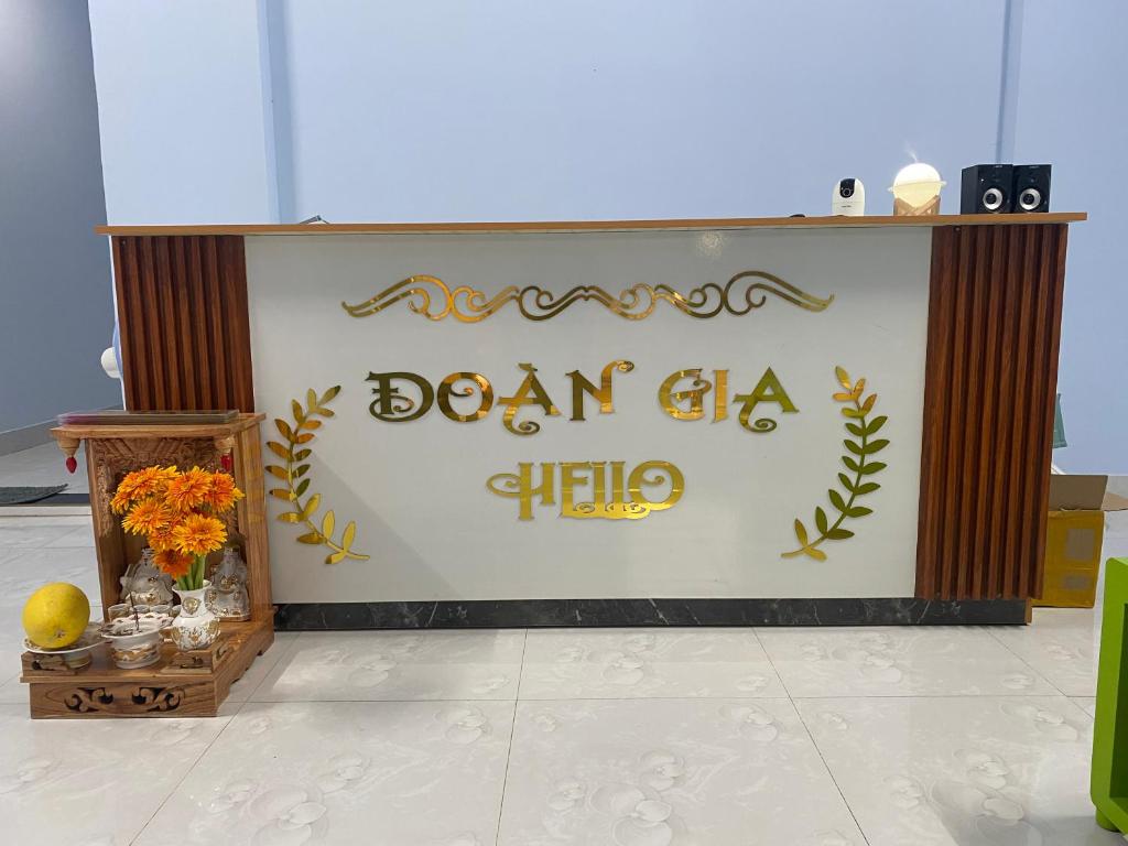 a stage with a sign for a dance hall at Nhà Nghỉ Đoàn Gia in Dồng Xoài