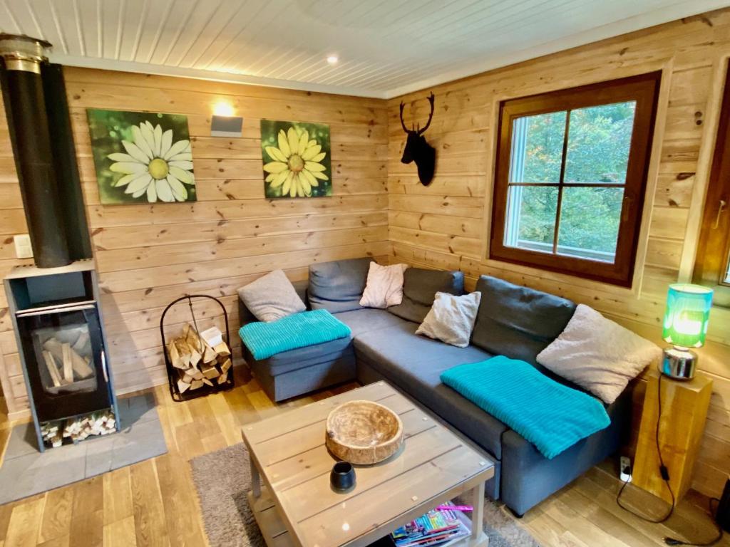Posezení v ubytování Chalet "A l Orée du bois"