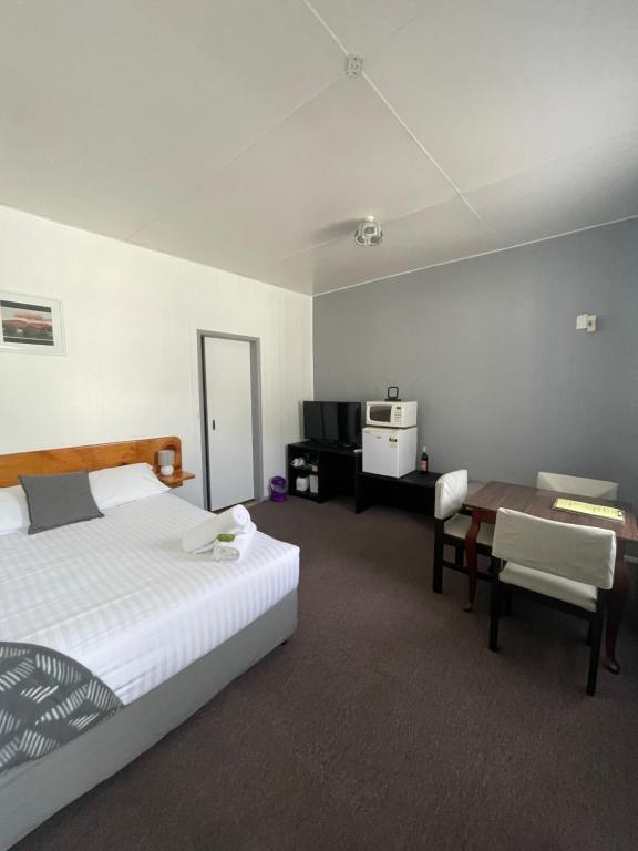 Postel nebo postele na pokoji v ubytování Mountain View Motel
