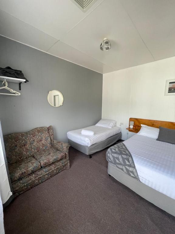 Postel nebo postele na pokoji v ubytování Mountain View Motel