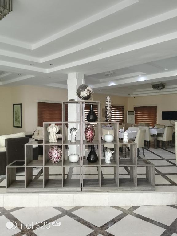 Posezení v ubytování Ellyxville Hotel
