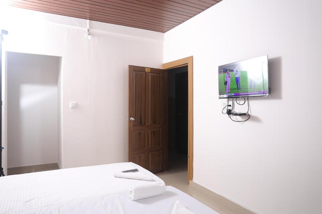 TV a/nebo společenská místnost v ubytování ACE SUITES
